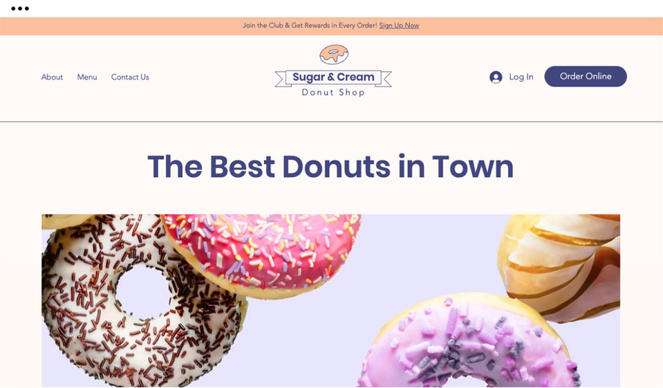 Homepage of a donut shop featuring a photo of donuts.